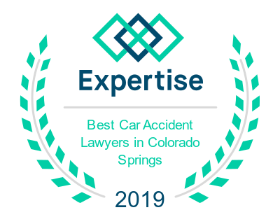 A graphic that reads: "Expertise. Best car accident lawyers in Colorado Springs. 2019."